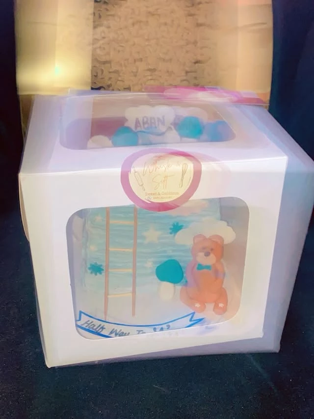 Happy 6-month celebration cake with 'Hello World' message for baby Aban - Milestone Celebration Cakes Karachi By Whisk And Sift